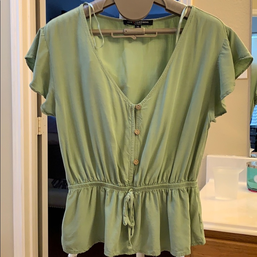Light olive green top.